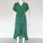 robe verte à pois blanc