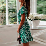robe verte fleurs blanches
